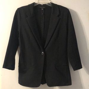Black stretch jacket, 3/4 length sleeves.